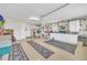 The spacious garage offers abundant storage, a utility sink, and laundry area, with painted floors at 1709 Latta Ct, The Villages, FL 32162