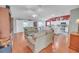 Spacious living room seamlessly connects to the kitchen, creating an open-concept living space at 1709 Latta Ct, The Villages, FL 32162