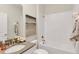 Bathroom featuring a shower and tub combo, neutral paint, and modern vanity at 1899 Clear Sky Dr, Kissimmee, FL 34744
