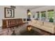 Comfortable living room with a fireplace, stylish decor, and ample seating perfect for entertaining guests at 2417 Coventry Ave, Lakeland, FL 33803