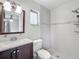 Bathroom features a modern vanity, tiled shower, and updated fixtures at 9526 Turkey Oak Bnd, Orlando, FL 32817