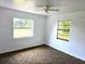 Bedroom featuring neutral walls, carpet, and windows at 5045 Swindell Rd, Lakeland, FL 33810
