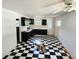 Kitchen with white walls and black cabinets at 5045 Swindell Rd, Lakeland, FL 33810