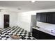 Kitchen features black-and-white checkerboard floor at 5045 Swindell Rd, Lakeland, FL 33810