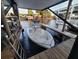 Covered boat dock with boat lift providing easy access to the open water at 166 Catfish St, Haines City, FL 33844