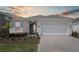 Charming single-story home with a well-manicured front yard and inviting curb appeal at 2797 Top Hill Ct, Minneola, FL 34715