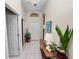 Bright foyer with tile flooring, chandelier, and decorative accents at 4662 Harts Brook Ln, Mulberry, FL 33860