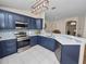 Modern kitchen with stainless steel appliances and designer backsplash at 4662 Harts Brook Ln, Mulberry, FL 33860