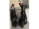 Two sets of golf clubs in bags, showcasing space for recreational activities and storage at 1087 Jackson St, The Villages, FL 32162