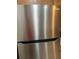 Kitchen features stainless steel refrigerator with modern design and clean lines at 1087 Jackson St, The Villages, FL 32162