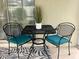 Cozy screened lanai with metal furniture and comfy cushions, perfect for relaxing outdoors at 1087 Jackson St, The Villages, FL 32162