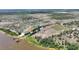 Extensive aerial perspective reveals lakefront property with expansive agricultural surroundings at 1395 S Lake Reedy Blvd, Frostproof, FL 33843