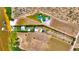 Aerial view of the property surrounded by trees and foliage at 1395 S Lake Reedy Blvd, Frostproof, FL 33843