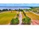 Expansive waterfront property with well-maintained landscaping and multiple buildings in a private and secluded setting at 1395 S Lake Reedy Blvd, Frostproof, FL 33843