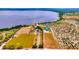 Aerial view of rural property with main residence marked with a red roof at 1395 S Lake Reedy Blvd, Frostproof, FL 33843