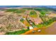 Aerial view of waterfront property with red roof marker at 1395 S Lake Reedy Blvd, Frostproof, FL 33843