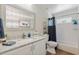 Bathroom with white cabinets and subway tiled shower/bath combination at 1395 S Lake Reedy Blvd, Frostproof, FL 33843