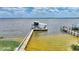 Wide angle aerial view of a boat dock and waterfront at 1395 S Lake Reedy Blvd, Frostproof, FL 33843