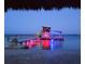 Well-lit boat dock on the lake with stairs and platform at 1395 S Lake Reedy Blvd, Frostproof, FL 33843
