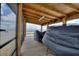 Covered boathouse with screened-in porch provides a shady spot to enjoy views of the water at 1395 S Lake Reedy Blvd, Frostproof, FL 33843