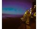 Lit Dock stairs on a body of water at night at 1395 S Lake Reedy Blvd, Frostproof, FL 33843