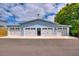 Detached garage featuring multiple bays, offering plenty of space for vehicles or storage at 1395 S Lake Reedy Blvd, Frostproof, FL 33843