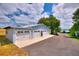 Detached garage featuring multiple bays, offering plenty of space for vehicles or storage at 1395 S Lake Reedy Blvd, Frostproof, FL 33843