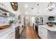 Open kitchen featuring stainless steel appliances, a large island, and stylish finishes for a modern look at 1395 S Lake Reedy Blvd, Frostproof, FL 33843