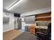 Home office with stainless refrigerator and desk, perfect for remote work at 1395 S Lake Reedy Blvd, Frostproof, FL 33843