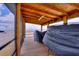 Relax on the screened patio with wood flooring and views of the waterfront at 1395 S Lake Reedy Blvd, Frostproof, FL 33843