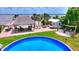 Pool and outdoor tiki bar with water views at 1395 S Lake Reedy Blvd, Frostproof, FL 33843