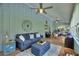 Spacious sunroom with seating area, dining area, and stylish decor at 1395 S Lake Reedy Blvd, Frostproof, FL 33843