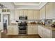 Kitchen features updated appliances, cabinetry, and granite countertops with ample counter space at 2161 Longleaf Cir, Lakeland, FL 33810