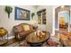 Relaxing living room highlighting a neutral color palette, fireplace, comfortable seating, and built-in shelving at 2161 Longleaf Cir, Lakeland, FL 33810