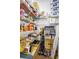 Organized pantry with wire shelving, stocked with canned goods, paper products, and cleaning supplies at 2161 Longleaf Cir, Lakeland, FL 33810