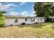 A view of the backyard and exterior at 129 5Th Jpv St, Winter Haven, FL 33880