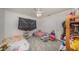 Functional bedroom with two beds, ceiling fan and ample light at 129 5Th Jpv St, Winter Haven, FL 33880