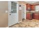 Galley kitchen with updated cabinets and appliances at 129 5Th Jpv St, Winter Haven, FL 33880