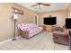 Comfortable living room with tile floors and ceiling fan at 129 5Th Jpv St, Winter Haven, FL 33880