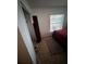 Bedroom with window views, closet, and rug flooring showcasing space and natural light at 1304 Avenue N, Haines City, FL 33844