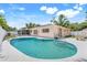 Refreshing backyard pool with ample deck space, perfect for relaxation and entertainment at 1604 Nottingham Dr, Winter Park, FL 32792