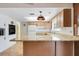 Bright kitchen with granite countertops, ample cabinet space, and modern appliances at 1604 Nottingham Dr, Winter Park, FL 32792