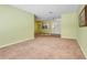 Cozy living room showcases open layout with easy access to the tiled foyer at 1604 Nottingham Dr, Winter Park, FL 32792