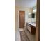 Clean bathroom features a spacious vanity with a white sink and a shower-tub combination at 313 Morning Creek Cir, Apopka, FL 32712