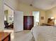 Bright bedroom with neutral paint, vaulted ceiling and convenient access to bathroom and dining area at 313 Morning Creek Cir, Apopka, FL 32712
