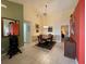 Cozy dining room with tile floors, neutral walls, and a wooden table set for four at 313 Morning Creek Cir, Apopka, FL 32712