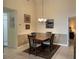 Dining room featuring neutral walls and a wooden table with seating for four at 313 Morning Creek Cir, Apopka, FL 32712