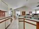 Bright eat-in kitchen featuring double sink, breakfast nook, and sliding glass door to lanai at 313 Morning Creek Cir, Apopka, FL 32712
