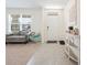 Inviting entryway with tiled flooring and a view into a comfortable living space at 5616 Siltstone St, Lakeland, FL 33811