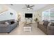 Comfortable living room with tile flooring, recessed lighting, and a ceiling fan at 5616 Siltstone St, Lakeland, FL 33811